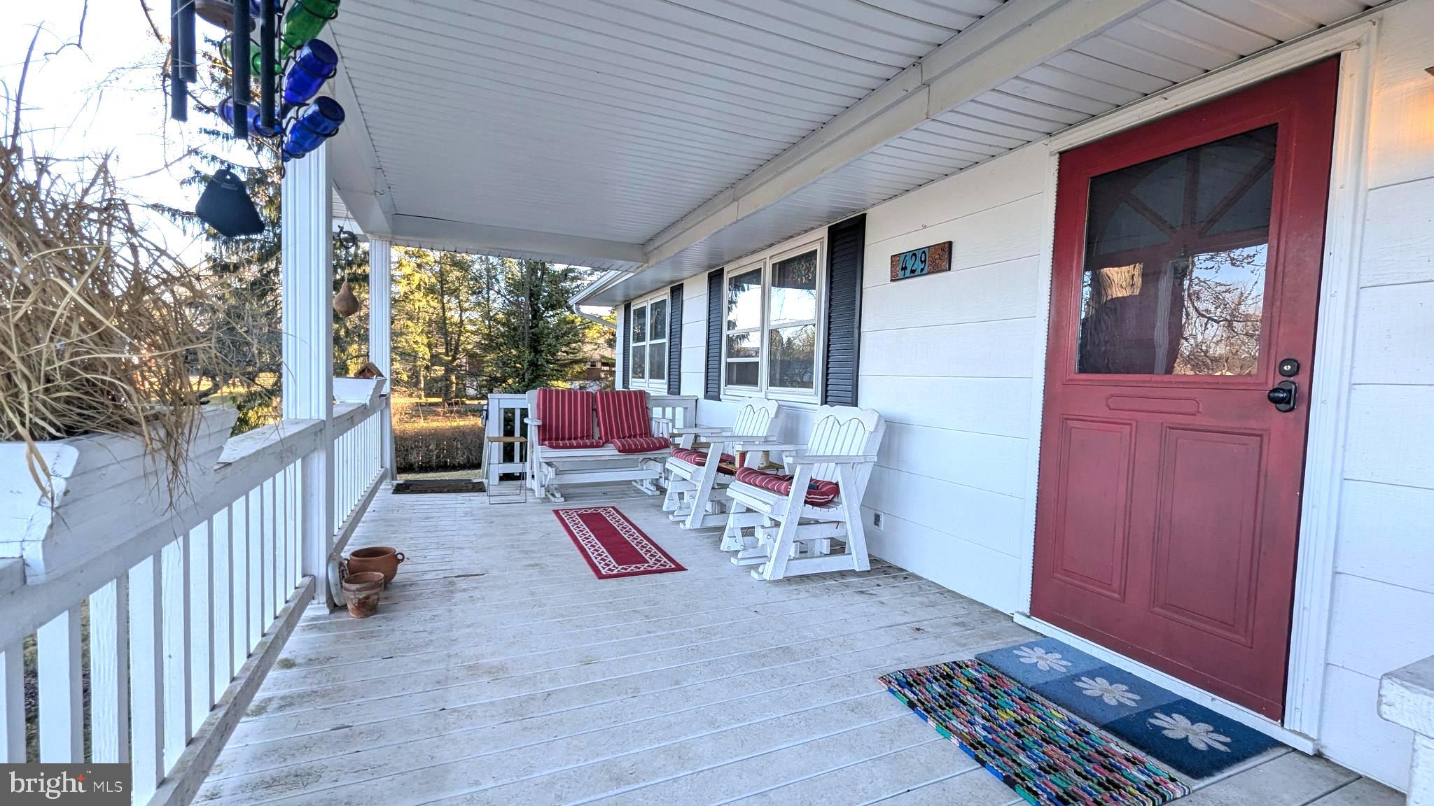 429 Simpson Street Bellefonte, PA 16823 - Photo 3 of 27 a view of a chairs in balcony