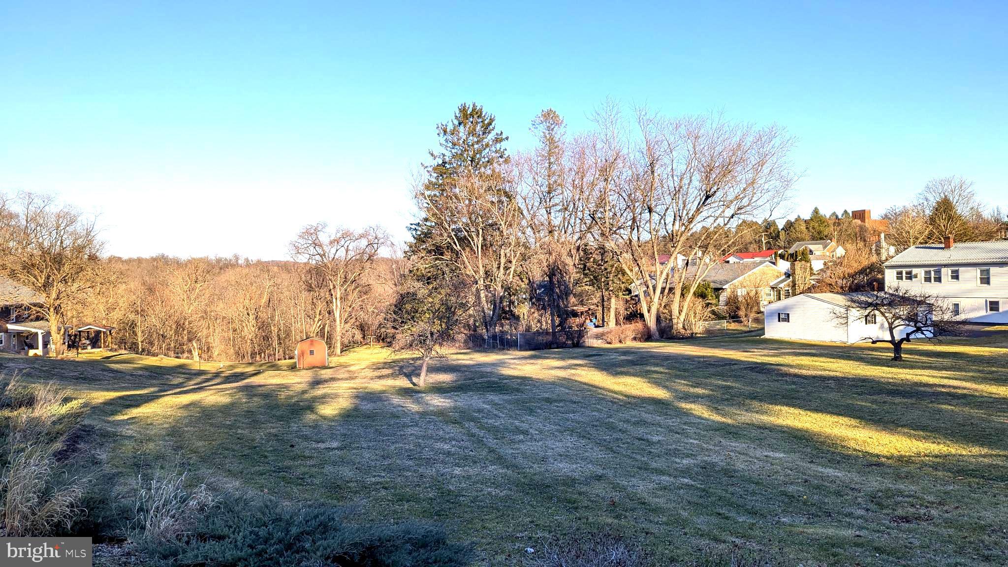 429 Simpson Street Bellefonte, PA 16823 - Photo 6 of 27 a view of a town with mountains