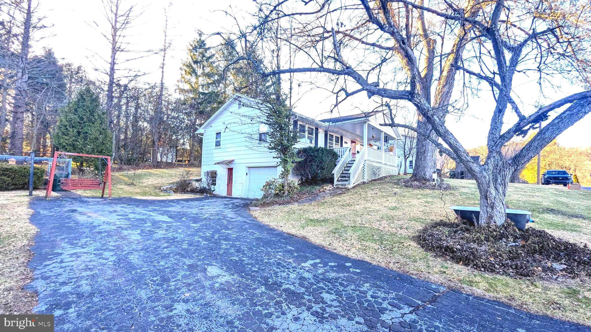 429 Simpson Street Bellefonte, PA 16823 - Photo 7 of 27 a view of a yard with a tree and a park
