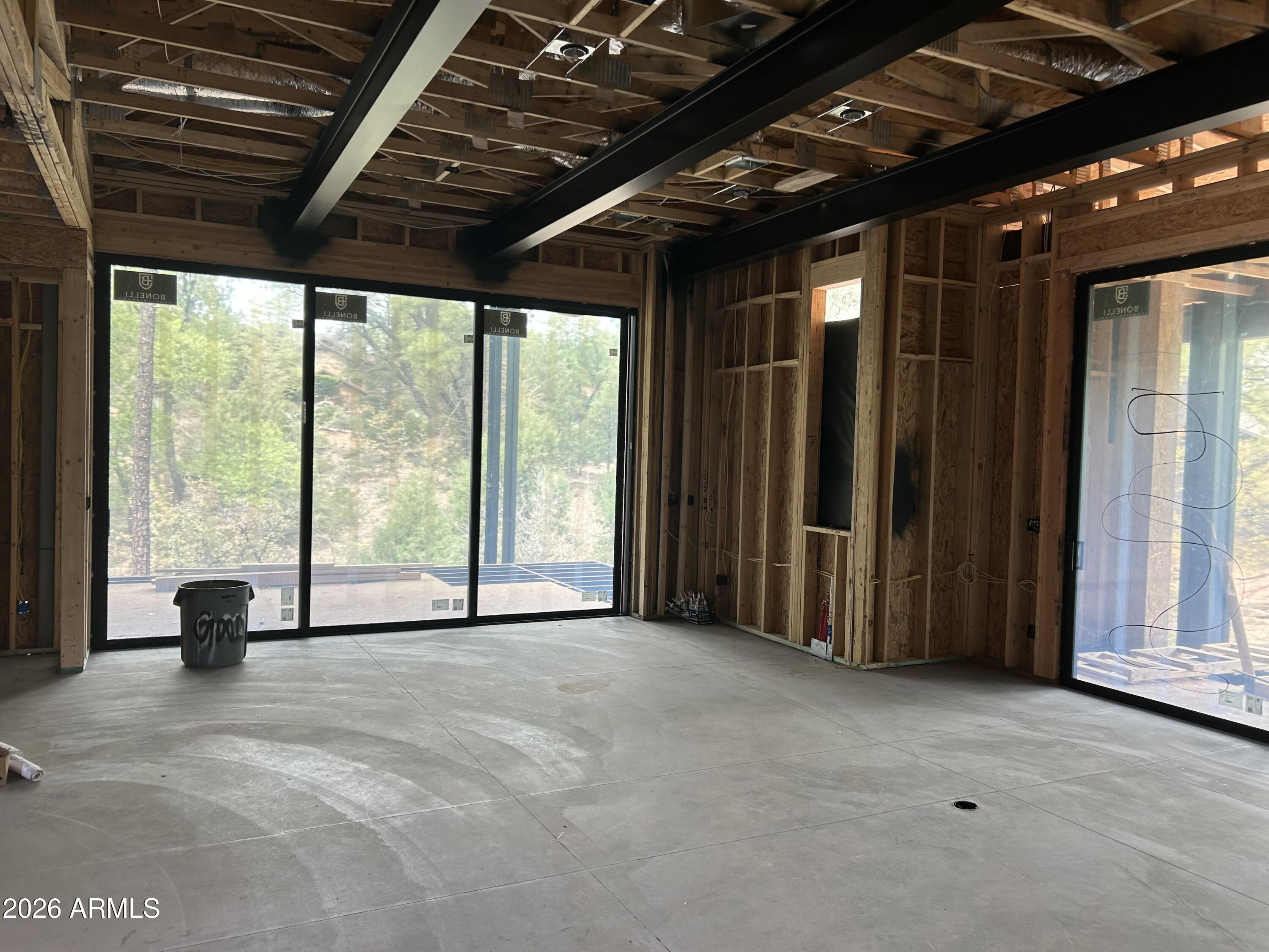3002 East Game Trail Payson, AZ 85541 - Photo 11 of 40 a view of an empty room with a sliding door