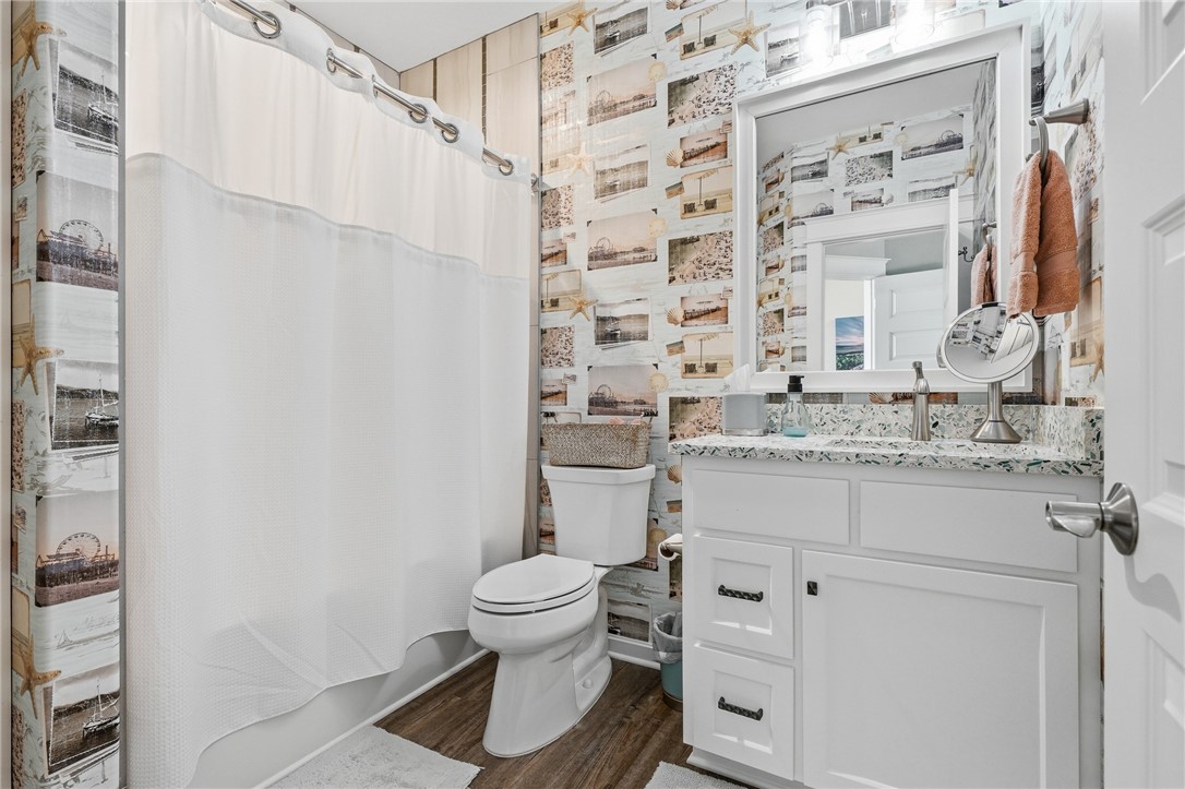 12 Sea Shell Shores Rockport, TX 78382 - Photo 21 of 40 a bathroom with a sink toilet and shower