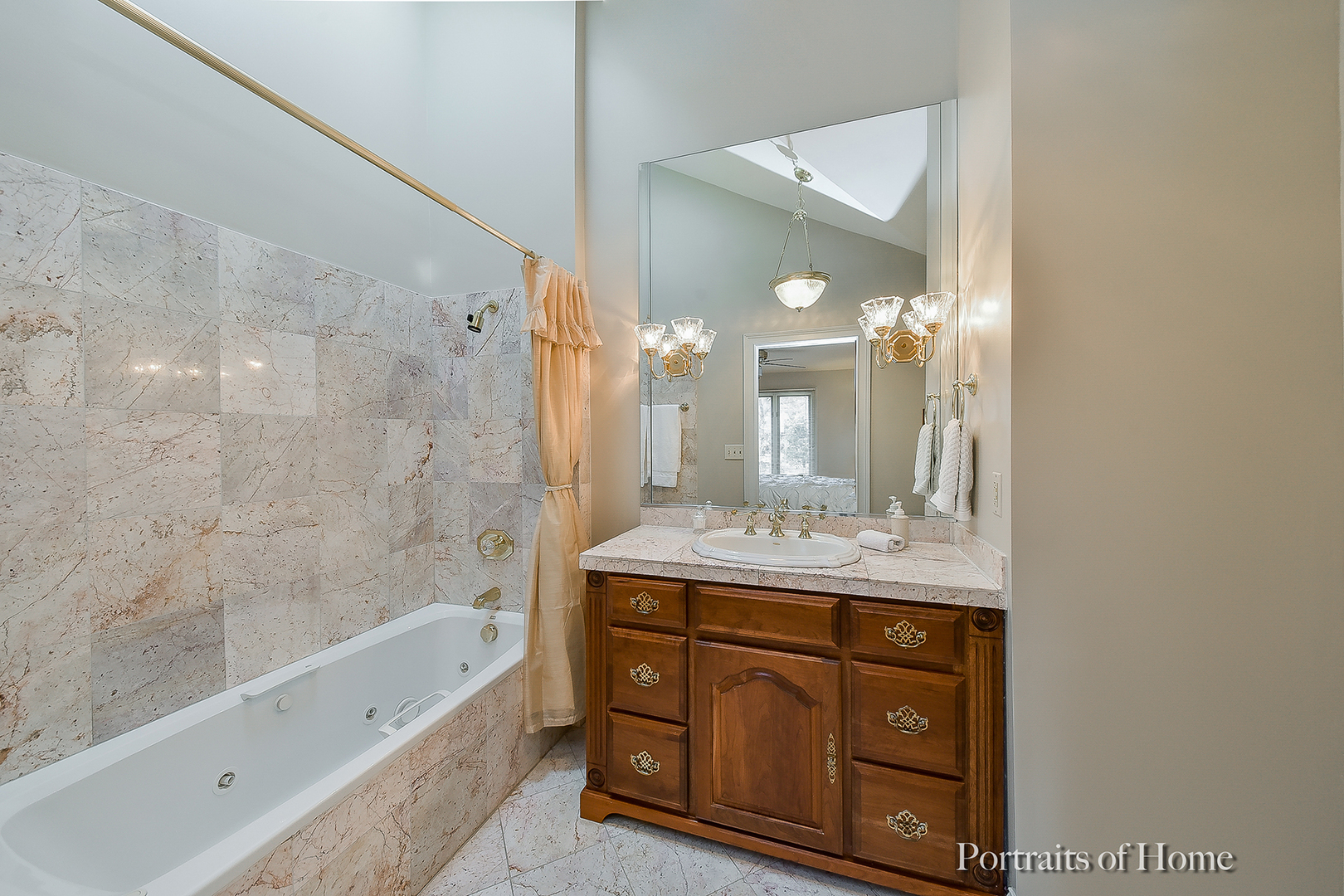 1508 East Bailey Road Naperville, IL 60565 - Photo 14 of 17 a bathroom with a granite countertop sink mirror and a bath tub