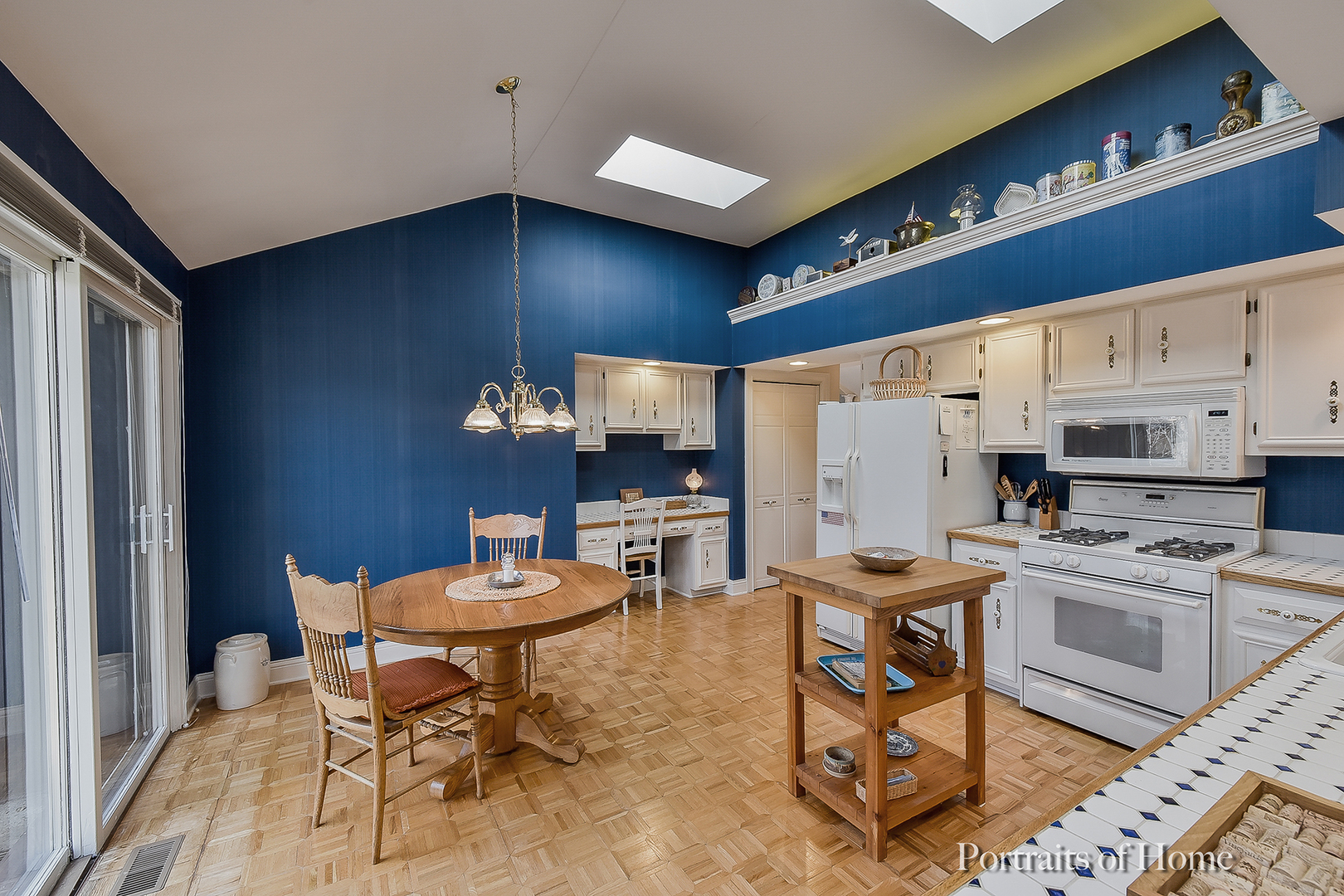 1508 East Bailey Road Naperville, IL 60565 - Photo 7 of 17 a kitchen with a table chairs and a stove