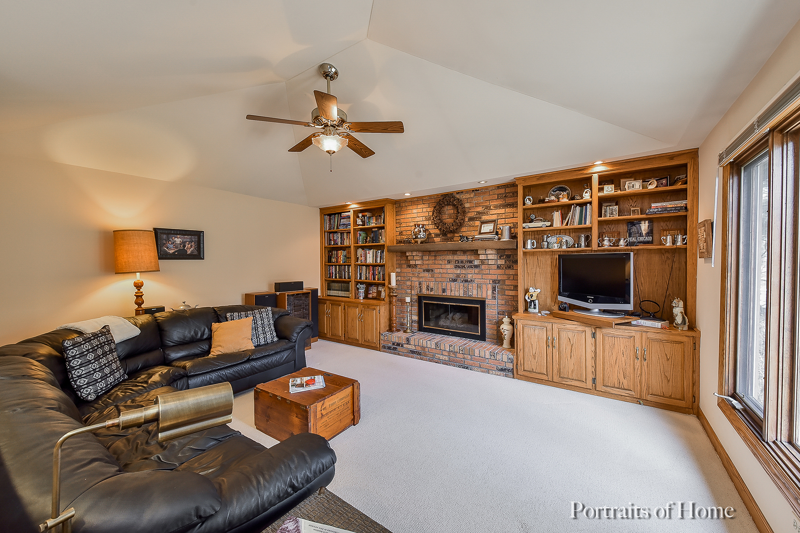 1508 East Bailey Road Naperville, IL 60565 - Photo 8 of 17 a living room with furniture and a flat screen tv