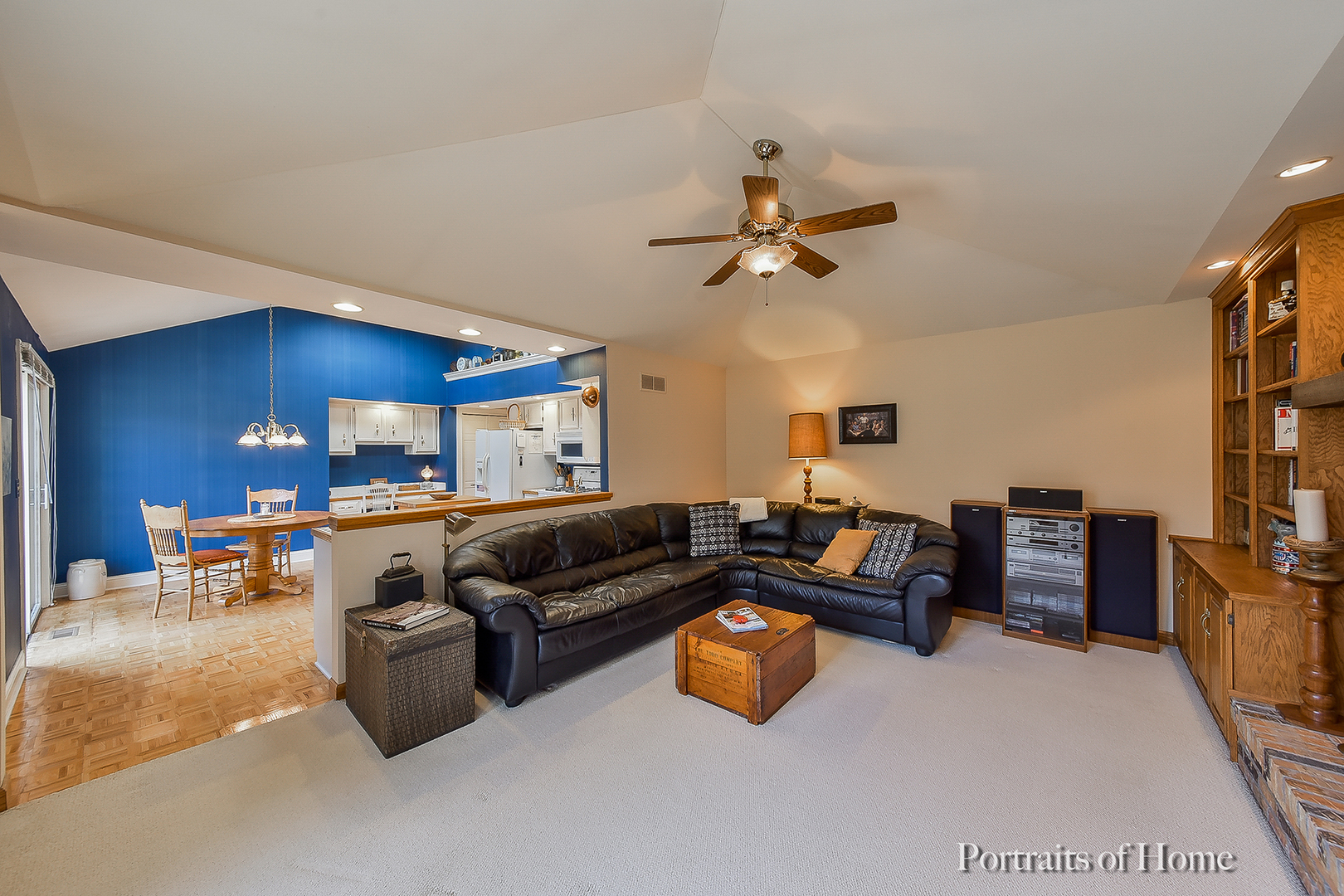 1508 East Bailey Road Naperville, IL 60565 - Photo 9 of 17 a living room with furniture kitchen view and a flat screen tv
