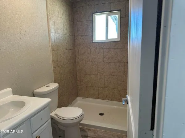 a bathroom with a sink and a toilet