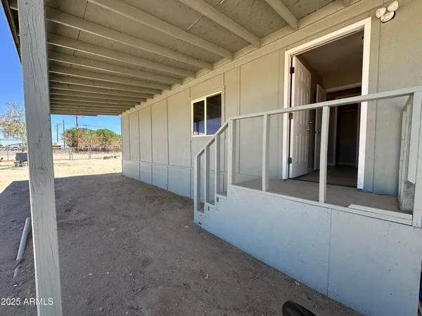 a view of a yard with a slide