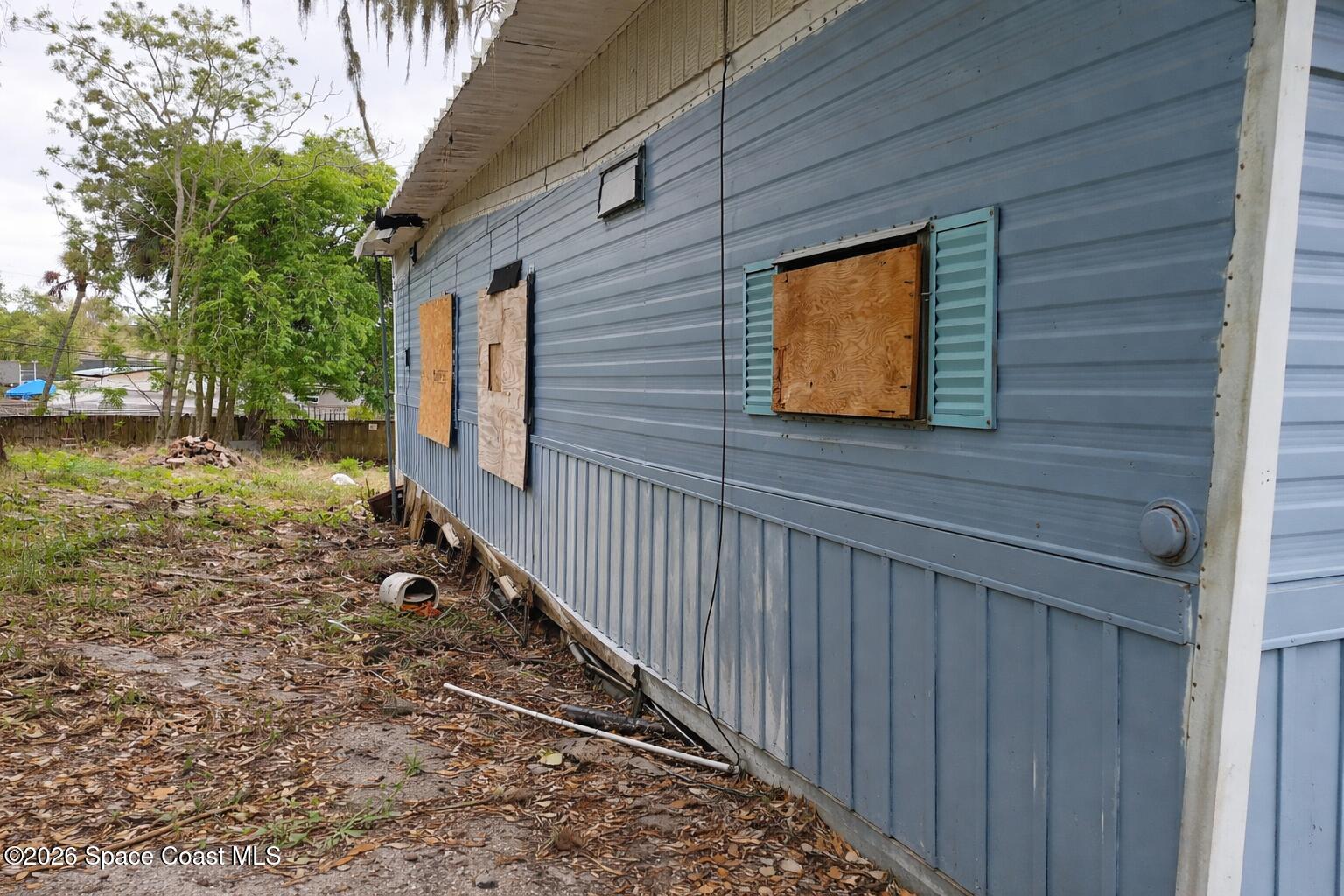 6969 Melaleuca Road Cocoa, FL 32927 - Photo 6 of 10 Side View