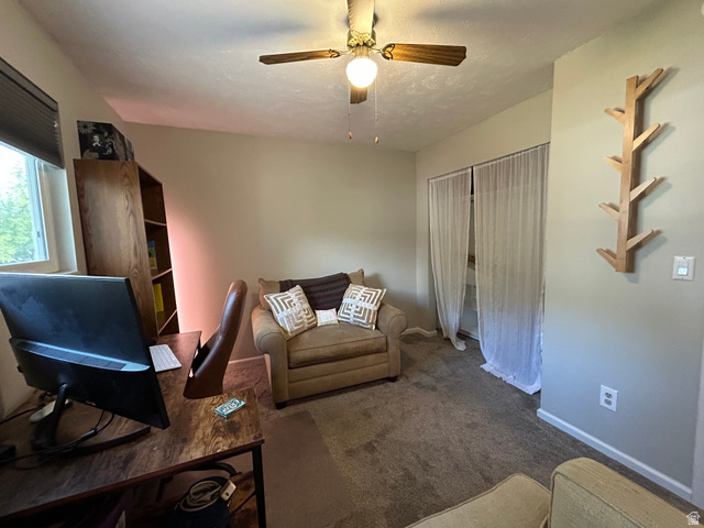 7659 State Street Midvale, UT 84047 - Photo 12 of 33 Home office with carpet flooring, a closet and a ceiling fan