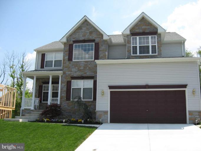 6 Vince Court Elkton, MD 21921 - Photo 1 of 21 a front view of a house with a yard and garage