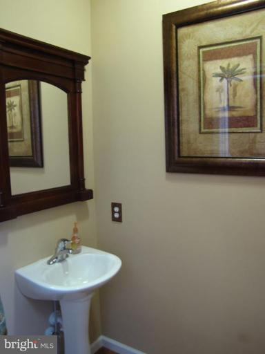 6 Vince Court Elkton, MD 21921 - Photo 6 of 21 a bathroom with a sink and a mirror
