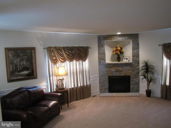 6 Vince Court Elkton, MD 21921 - Photo 7 of 21 a living room with furniture and a fireplace