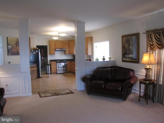 6 Vince Court Elkton, MD 21921 - Photo 9 of 21 a living room with furniture and a lamp