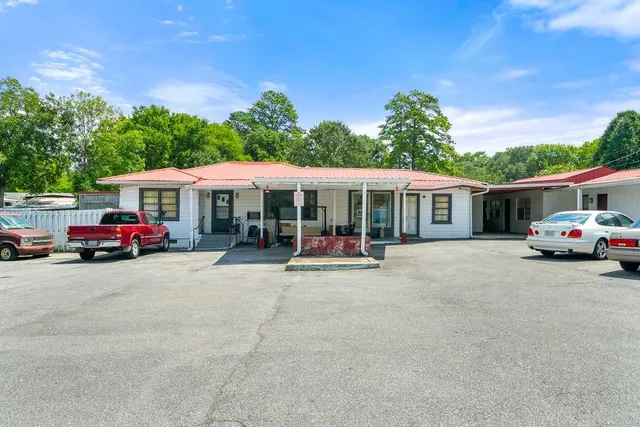 a car parked in front of a house