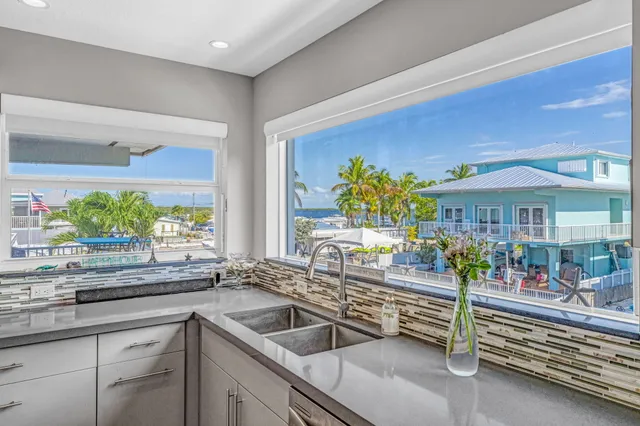 a kitchen with a sink and counter top space