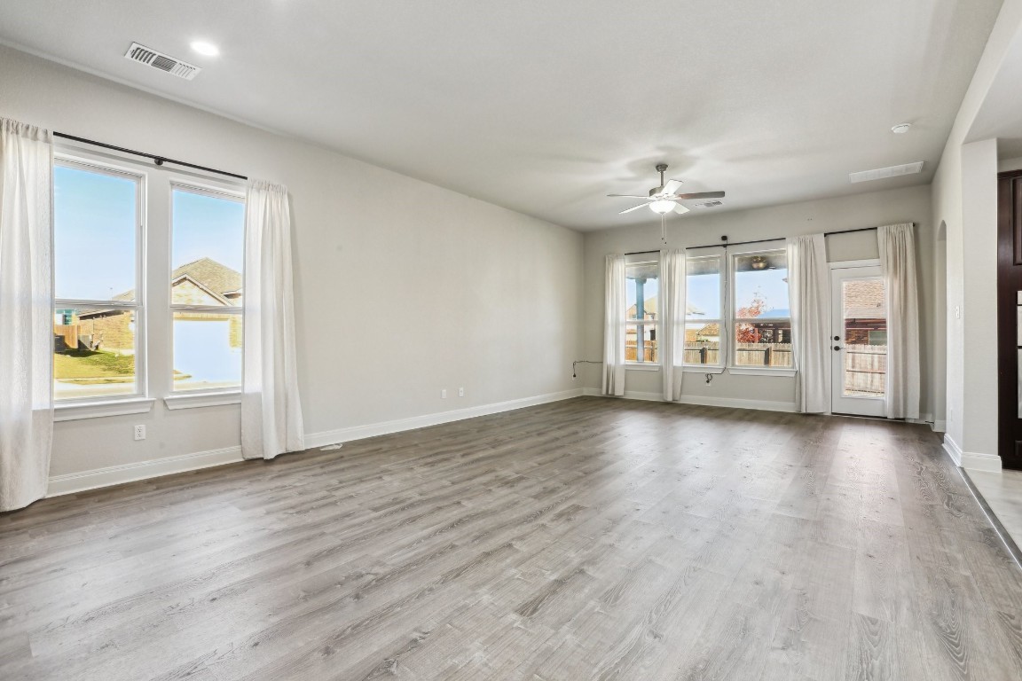 3602 Chaff Lane Pflugerville, TX 78660 - Photo 5 of 28 Spare room featuring light hardwood / wood-style flooring and ceiling fan