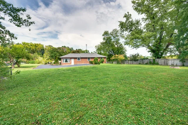 a house view with a garden space