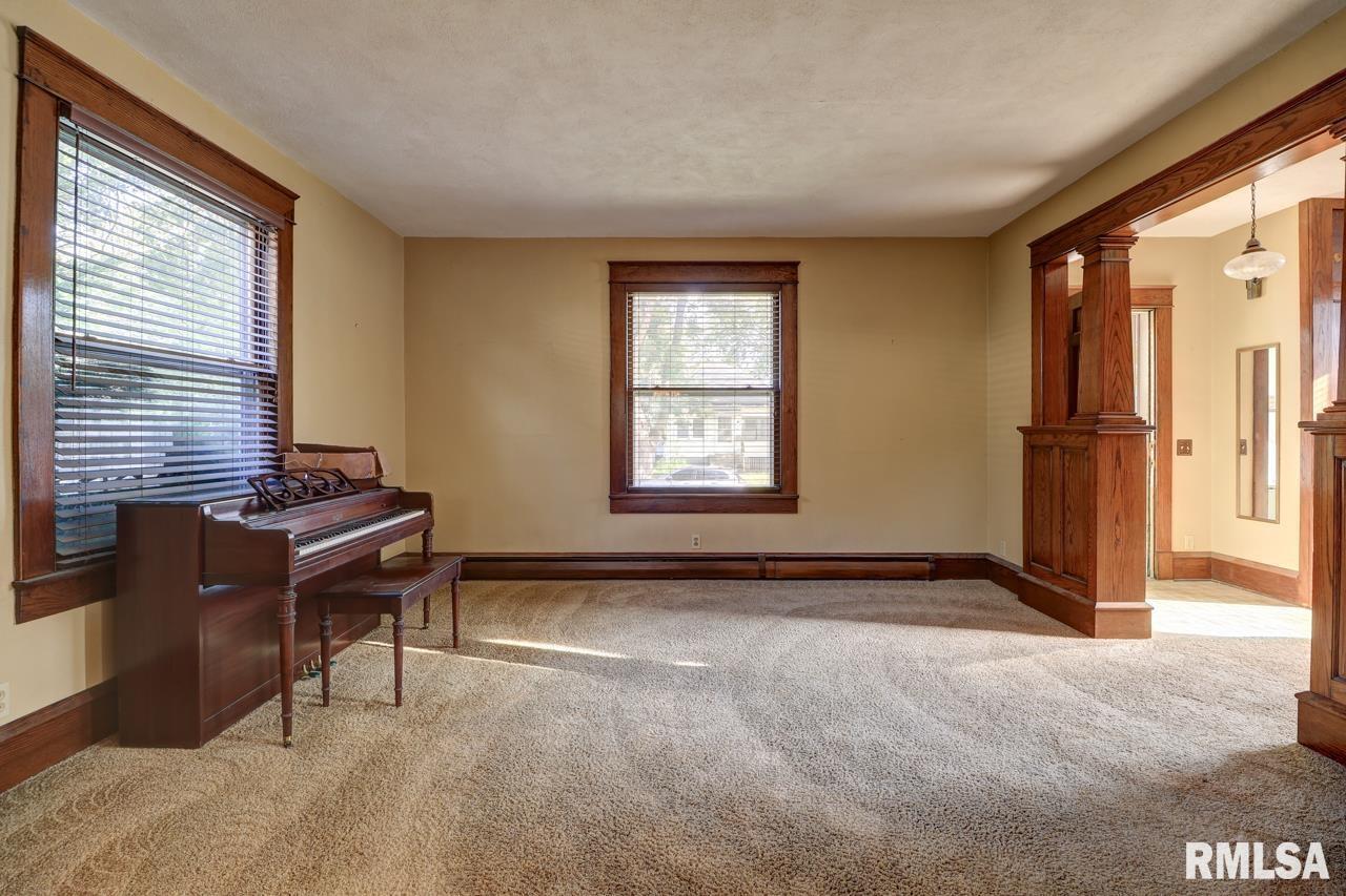 823 14th Avenue South Clinton, IA 52732 - Photo 11 of 27 a view of workspace with furniture and windows