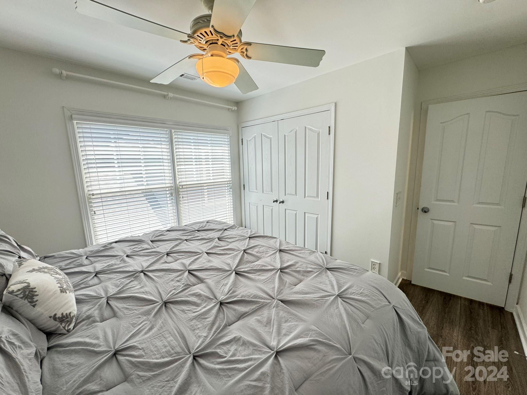1031 Market Street Fort Mill, SC 29708 - Photo 17 of 26 a bedroom with a bed and a window