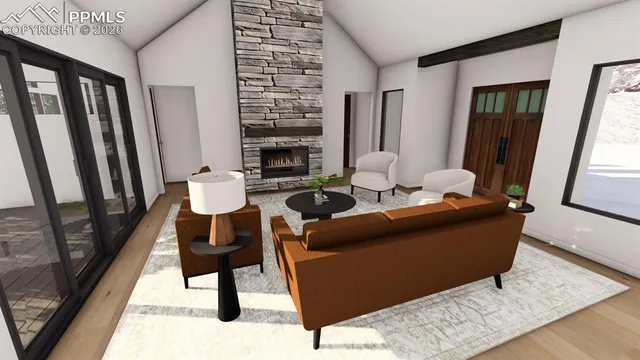 a living room with furniture and a fireplace
