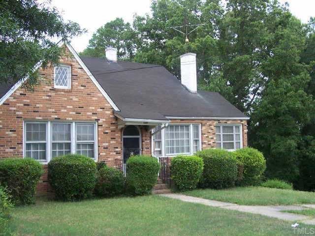132 Harris Street Roxboro, NC 27573 - Photo 1 of 4 a view of a house with a yard