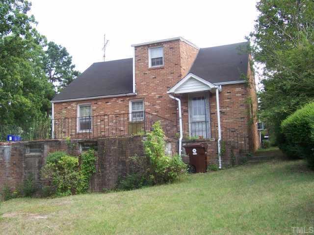 132 Harris Street Roxboro, NC 27573 - Photo 4 of 4 front view of a house with a garden