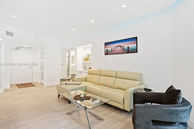 a living room with furniture and a couch