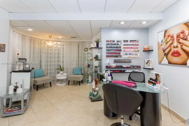 a room with gym equipment and a view of living room