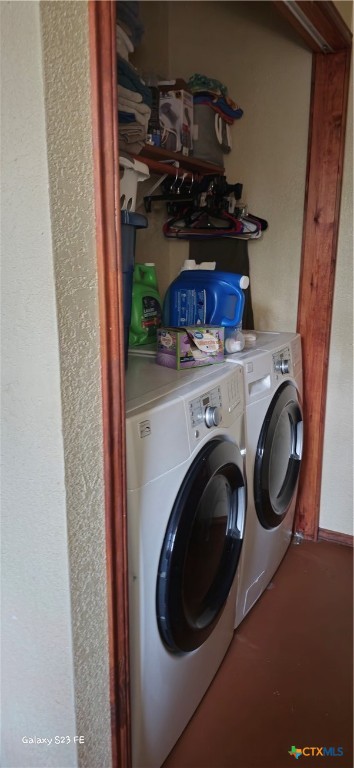 414 Harl Street Pleasanton, TX 78064 - Photo 21 of 28 a utility room with dryer and washer