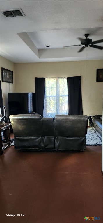 414 Harl Street Pleasanton, TX 78064 - Photo 7 of 28 a living room with furniture a air conditioner and a flat screen tv