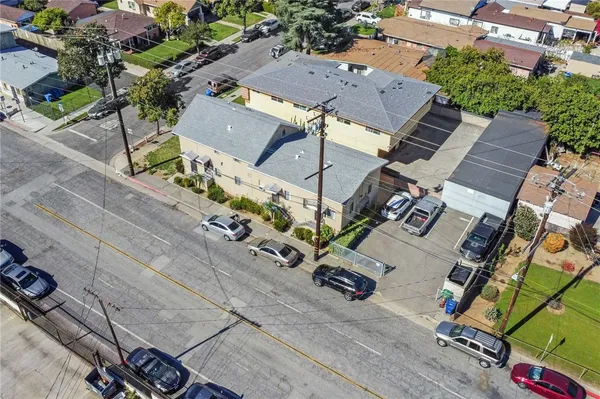 an aerial view of a house with garden