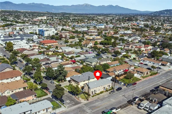 an aerial view of a house with a garden
