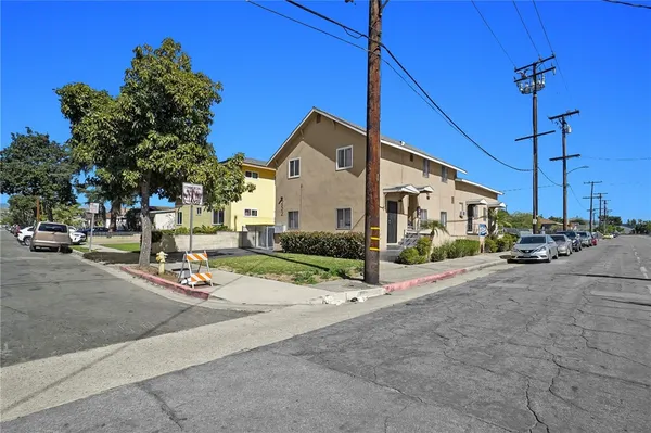 a view of a street with cars