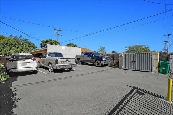 a view of a cars park in front of house