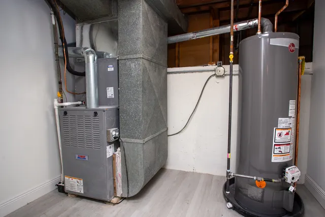 a view of a house with a yard and a garden