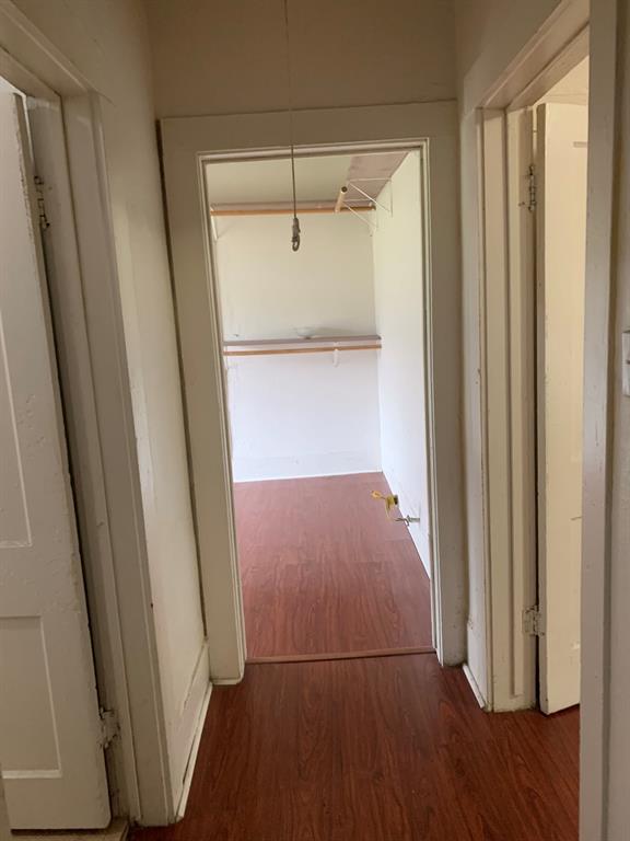 2321 Greer Street Dallas, TX 75215 - Photo 8 of 15 a view of walk in closet with empty racks