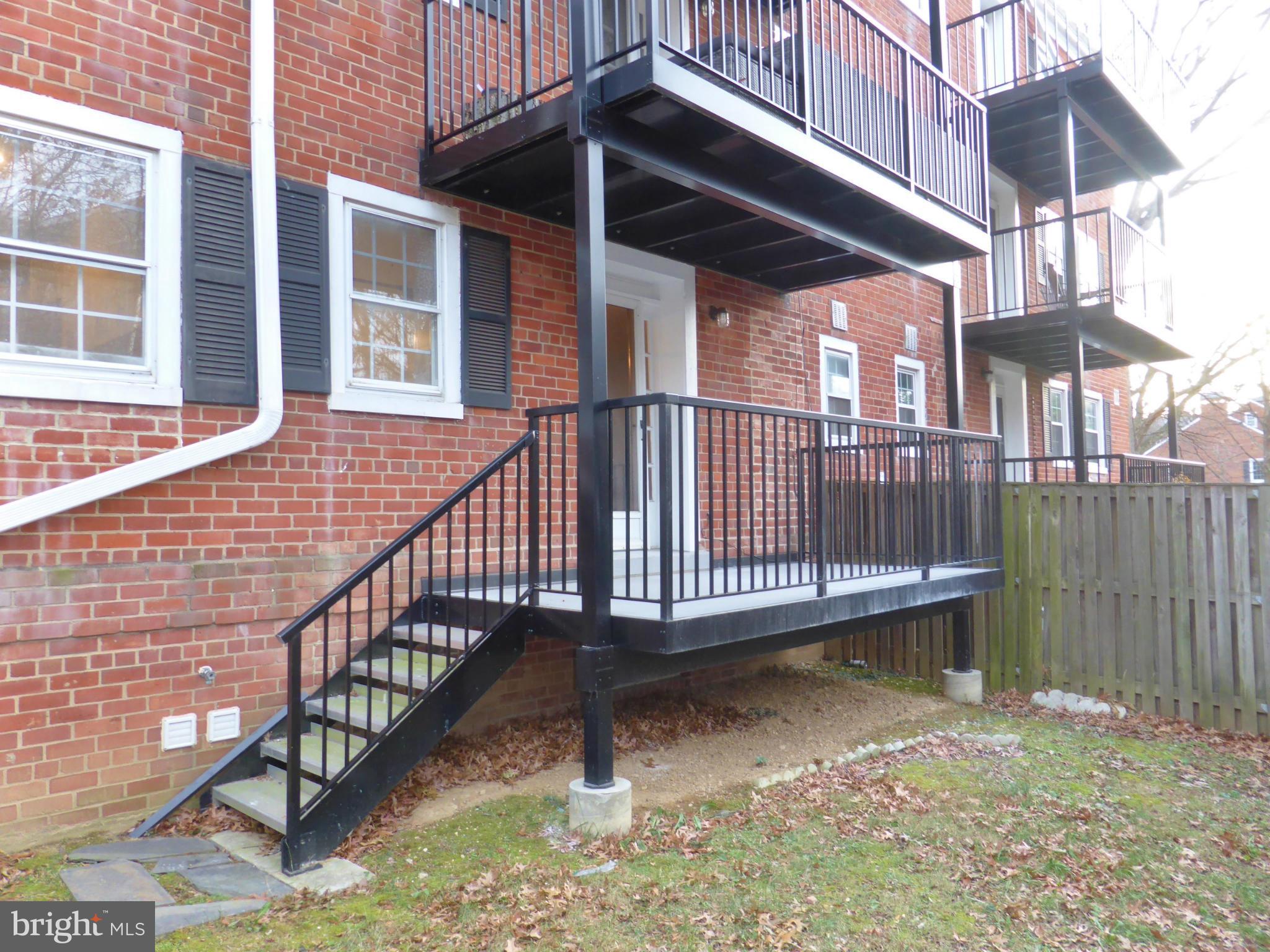 2916 South Buchanan Street, Unit A2 Arlington, VA 22206 - Photo 16 of 19 a view of a house with backyard and deck
