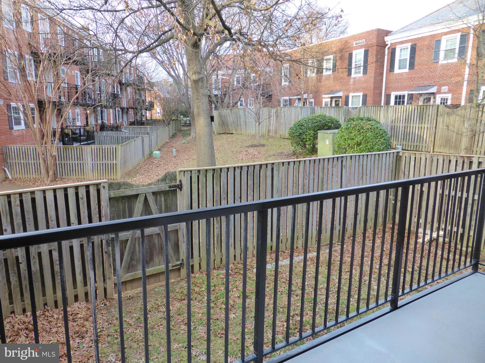 2916 South Buchanan Street, Unit A2 Arlington, VA 22206 - Photo 18 of 19 a view of a brick building from a balcony