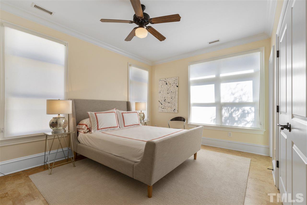 2010 White Oak Road Raleigh, NC 27608 - Photo 22 of 30 a bedroom with a bed and a window