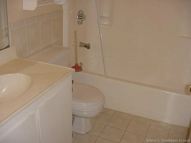 a bathroom with a sink and toilet
