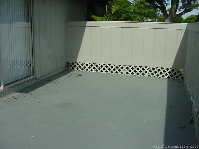 a view of a wooden fence