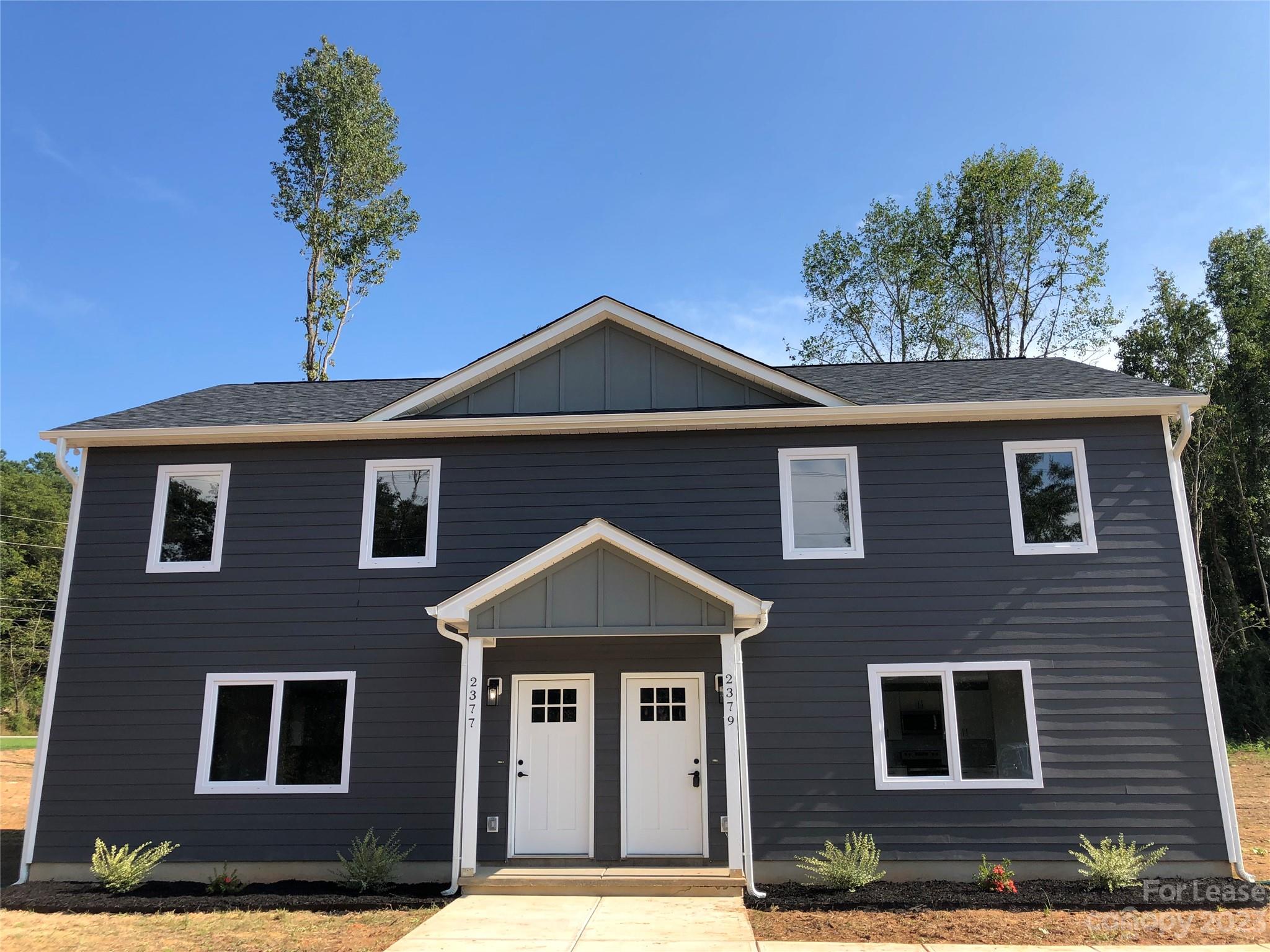2379 Laboratory Road Lincolnton, NC 28092 - Photo 1 of 19 a front view of a house with a yard