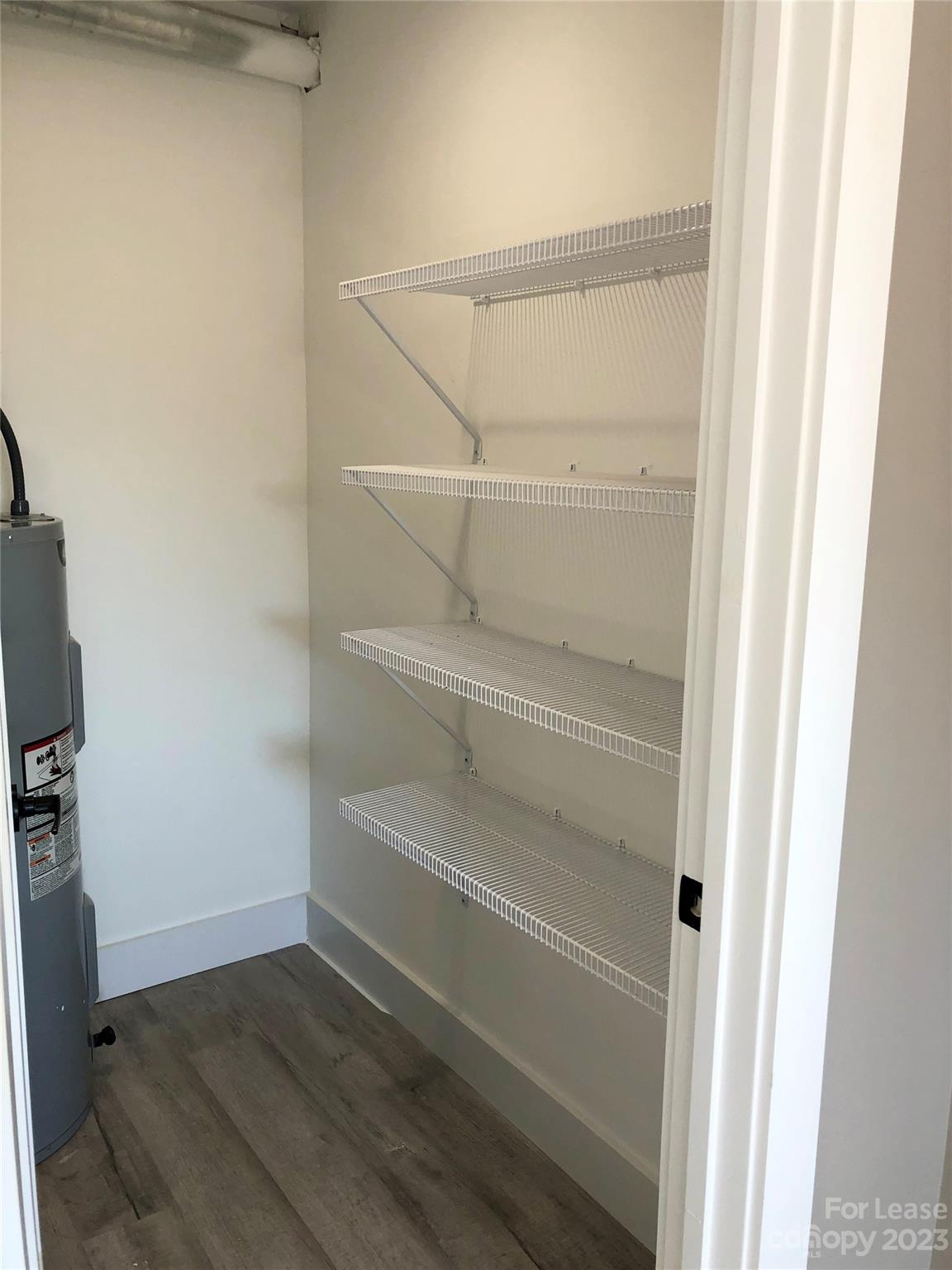2379 Laboratory Road Lincolnton, NC 28092 - Photo 17 of 19 a view of walk in closet with empty racks