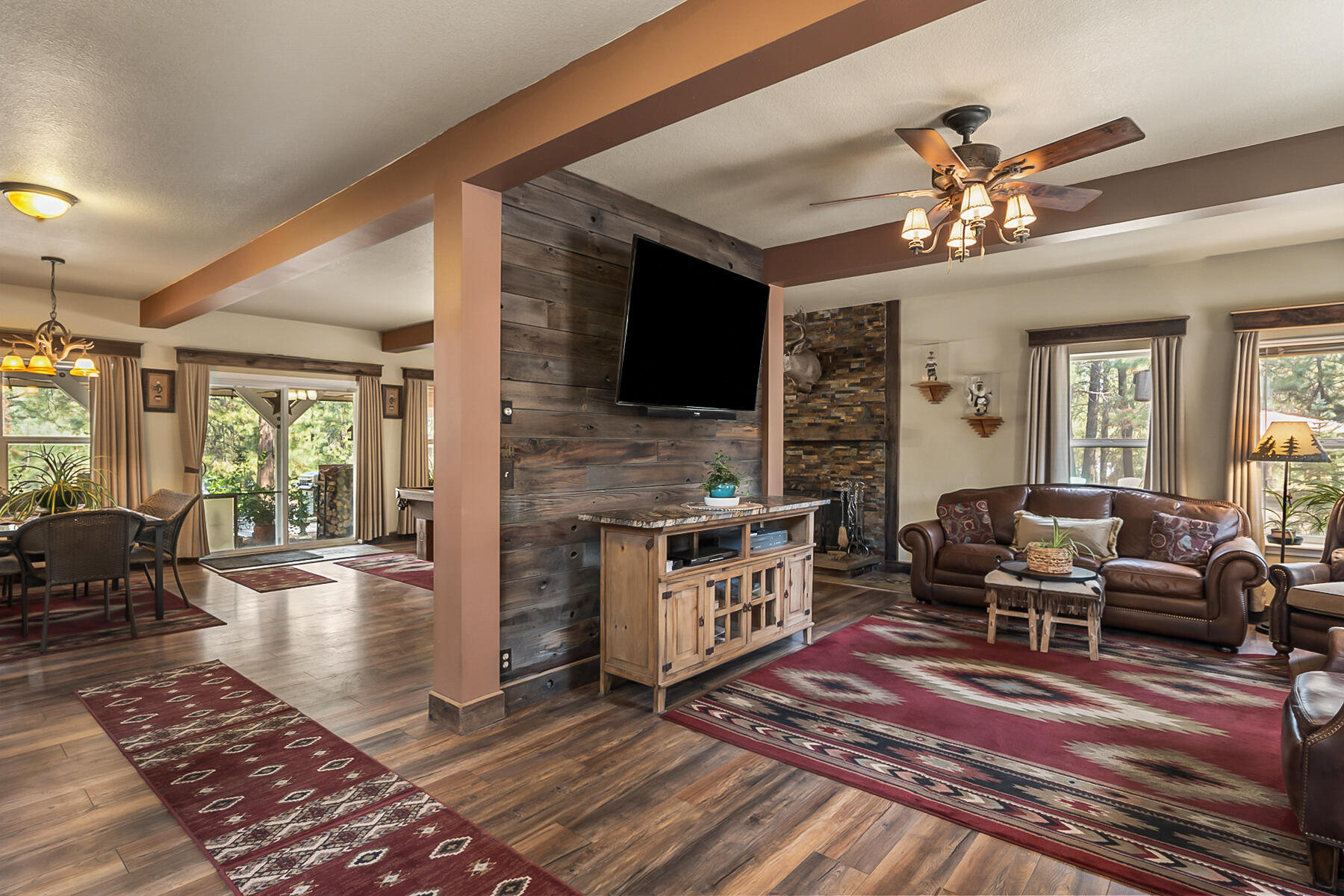 15730 Jackpine Road La Pine, OR 97739 - Photo 6 of 43 a living room with fireplace furniture and a flat screen tv