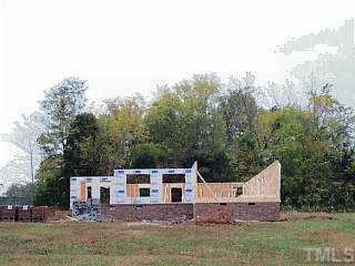 1 Fork Junction Road Timberlake, NC 27583 - Photo 1 of 1 a view of a house with a yard