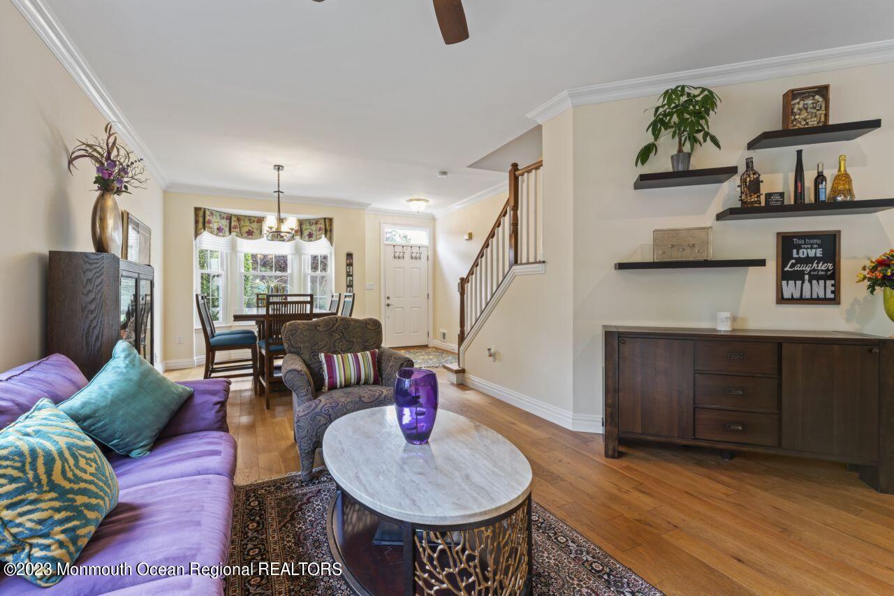 18 Nicholson Key Colts Neck, NJ 07722 - Photo 12 of 46 a living room with furniture and wooden floor
