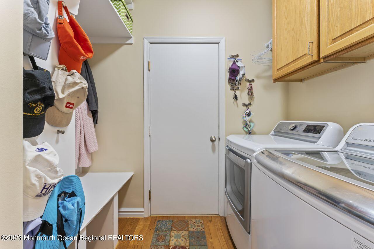 18 Nicholson Key Colts Neck, NJ 07722 - Photo 17 of 46 a utility room with dryer and washer