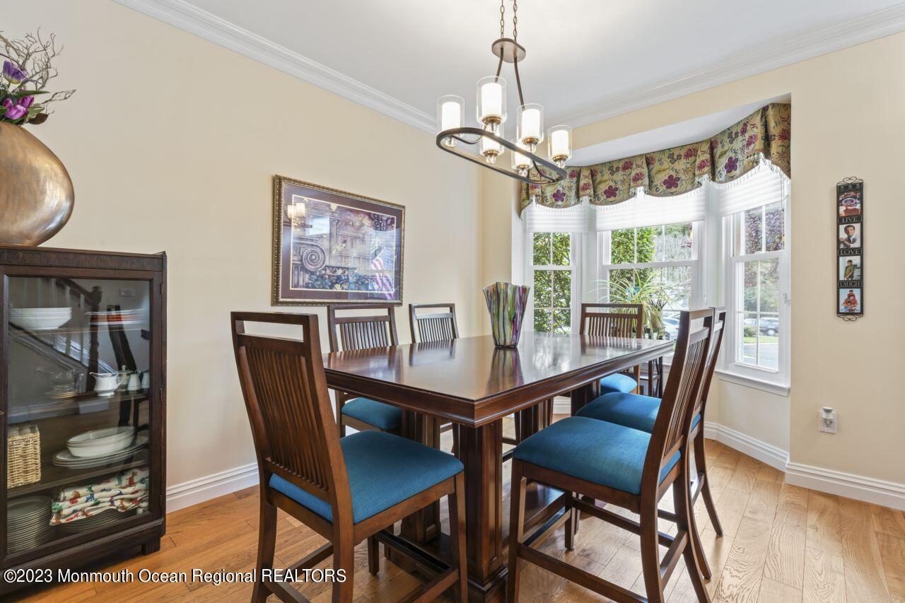 18 Nicholson Key Colts Neck, NJ 07722 - Photo 2 of 46 a view of a dining room with furniture window and wooden floor