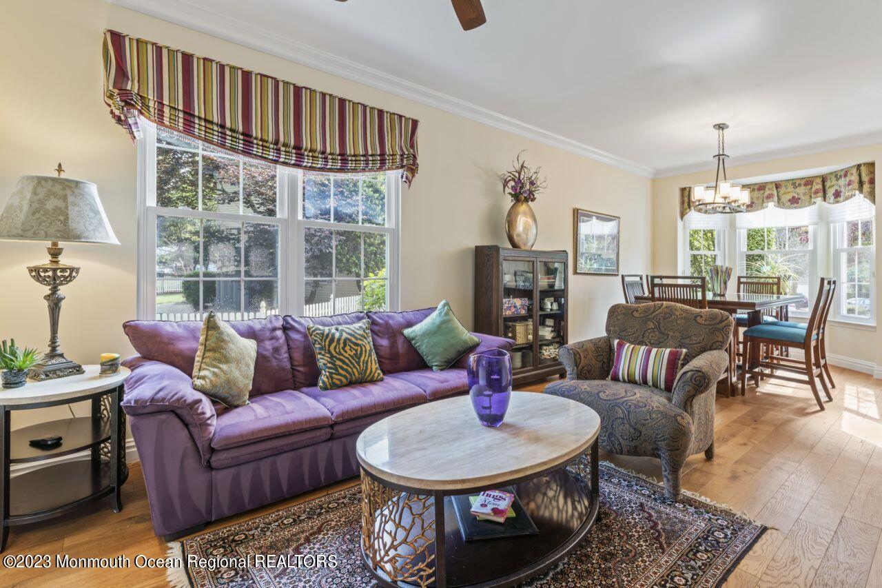 18 Nicholson Key Colts Neck, NJ 07722 - Photo 46 of 46 a living room with furniture and a large window