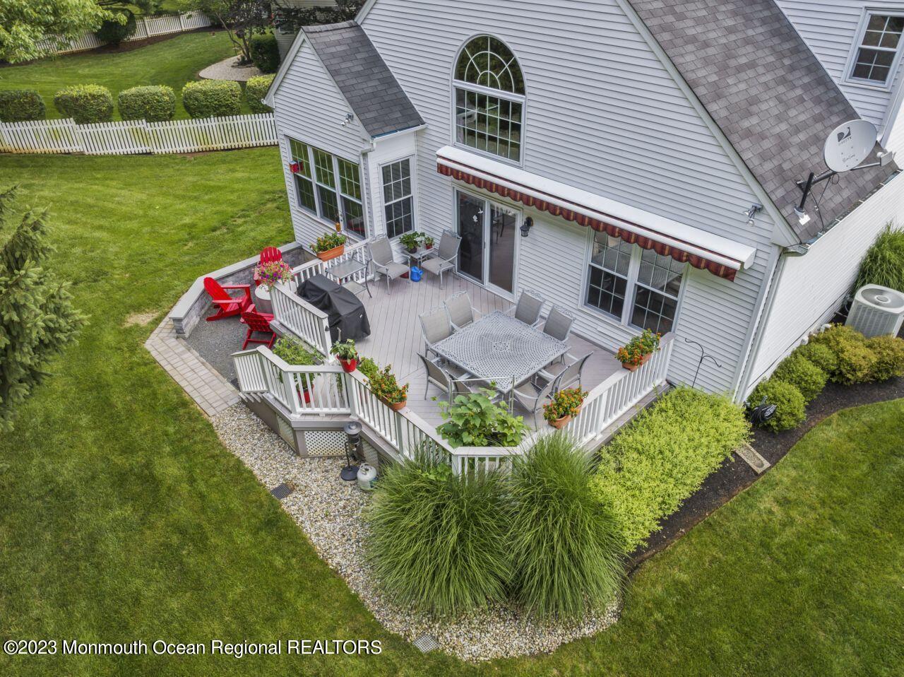 18 Nicholson Key Colts Neck, NJ 07722 - Photo 34 of 46 a aerial view of a house with a yard